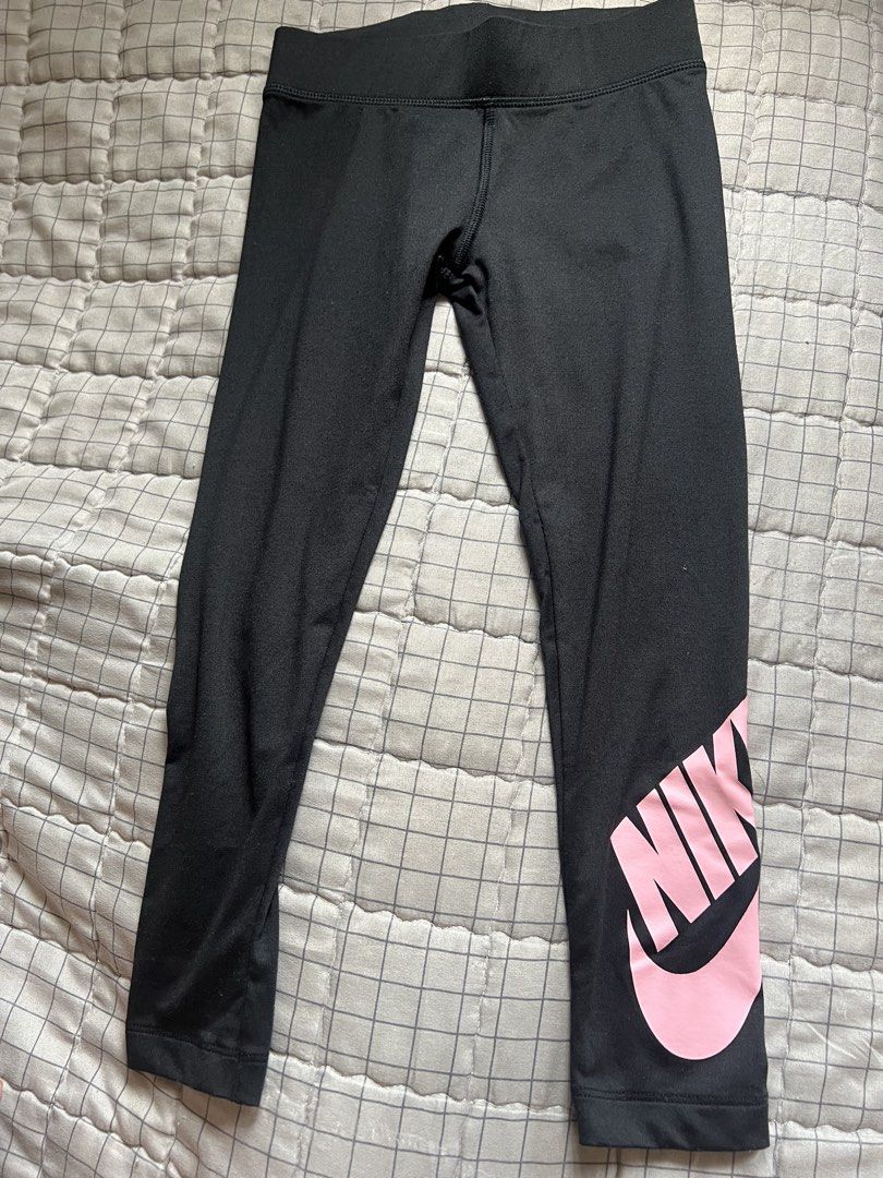 Authentic Nike Leggings with Pink Logo (Category: Babies & Kids Fashion) located in Quezon City. Submitted by bubspreloved (Listing ID 1426024728, Image 1). Description: Authentic bought in Canada. Good as new used twice for running. Outgrown. 6-7 yo on tag.