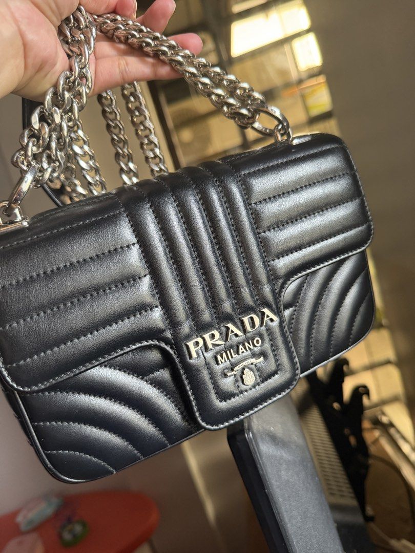 SOLD!! Authentic Prada Diagramme Small (Category: Luxury Bags & Wallets) located in Santiago. Submitted by realjoan (Listing ID 1426152301, Image 2). Description: In very good condition Pasado maarte Comes dustbag Slightly negotiable .