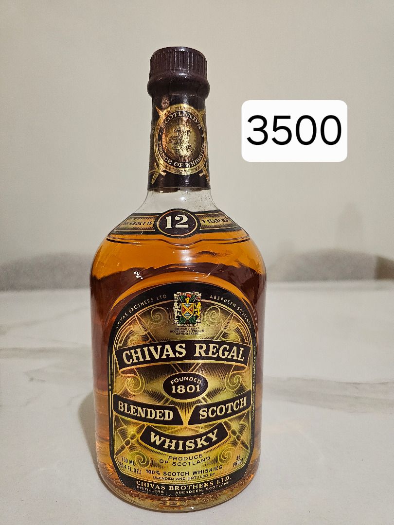 Chivas Regal 12 Blended Scotch Whisky (Category: Beverages) located in Quezon City. Submitted by artjplim (Listing ID 1426127717, Image 2). Description: Chivas Regal 12 Blended Scotch Whisky. It is a product of Scotland. The bottle has a brown cap and a golden label with the brand name and other details. The price is 3500..