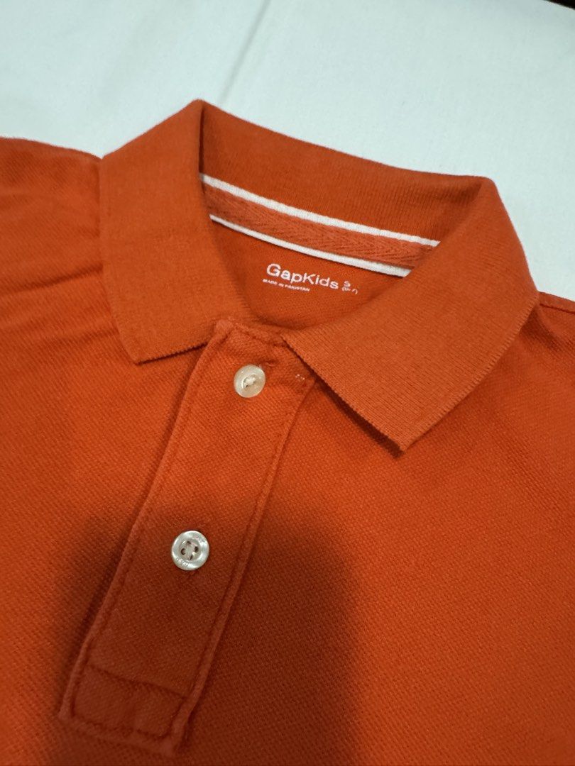 Gap polo shirt for boys (Category: Babies & Kids Fashion) located in Batangas. Submitted by GDW98 (Listing ID 1426083329, Image 3). Description: Brand: Gap Condition: Gently used, no flaws Color: Orange Size: 6-7 on tag but can fit up to 8-9 RFS: outgrown MOP: bank transfer, gcash SF c/o buyer M-F except holidays.