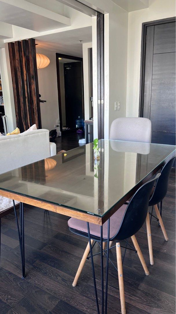 Walnut Dining Table with Tempered glass top (Category: Tables & Sets) located in Taguig. Submitted by letgogarage (Listing ID 1426084502, Image 1). Description: Custom Solid Wood Dining Table w/ Tempered glass - 15,000 (Still negotiable) Custom-made dining set featuring a solid Gemelina wood top and matte black steel hairpin legs. Comfortably seats 6 ✔ Solid wood construction ✔ Premium custom piece (not mass-produced) ✔ Space-efficient footprint 
