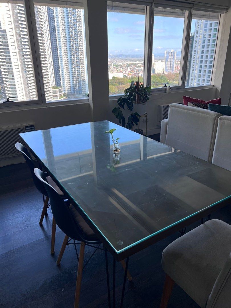 Walnut Dining Table with Tempered glass top (Category: Tables & Sets) located in Taguig. Submitted by letgogarage (Listing ID 1426084502, Image 3). Description: Custom Solid Wood Dining Table w/ Tempered glass - 15,000 (Still negotiable) Custom-made dining set featuring a solid Gemelina wood top and matte black steel hairpin legs. Comfortably seats 6 ✔ Solid wood construction ✔ Premium custom piece (not mass-produced) ✔ Space-efficient footprint 
