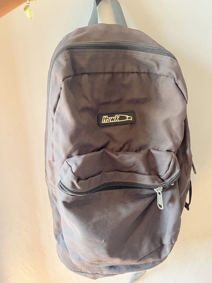 hawk backpack school bag everyday backpack lightweight (Category: Backpacks) located in Meycauayan. Submitted by drisloved (Listing ID 1426025688, Image 2). Description: hawk backpack in brown. lightweight and practical backpack perfect for school, work, travel, or everyday use. • brand: hawk • color: brownish grey black • style: backpack condition: used condition. may have some stains and dust due to storage but only needs cleaning. zippers are 