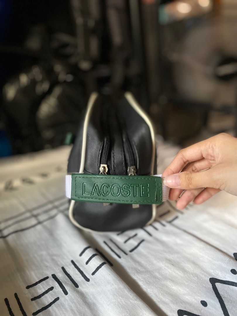 Lacoste Bag (Category: Luxury Bags & Wallets) located in Paranaque City. Submitted by d_clutterss (Listing ID 1426065987, Image 2). Description: - from hongkong - has minor flaws inside the bag only - rfs decluttering.