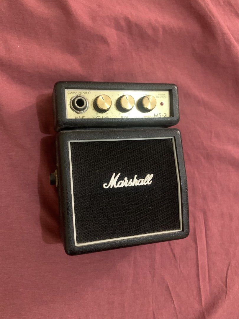 Marshall MS-2 Mini Guitar Amplifier (Category: Soundbars, Speakers & Amplifiers) located in Manila. Submitted by gamingthriftshop (Listing ID 1426054678, Image 1). Description: PAUNAHAN NALANG!! Discounted! Barely used Bought 2020 Naging display nalang siya No battery Decluttering need cash Marikina Area Pwede lalmove or pick up Pwede gcash or BPI.