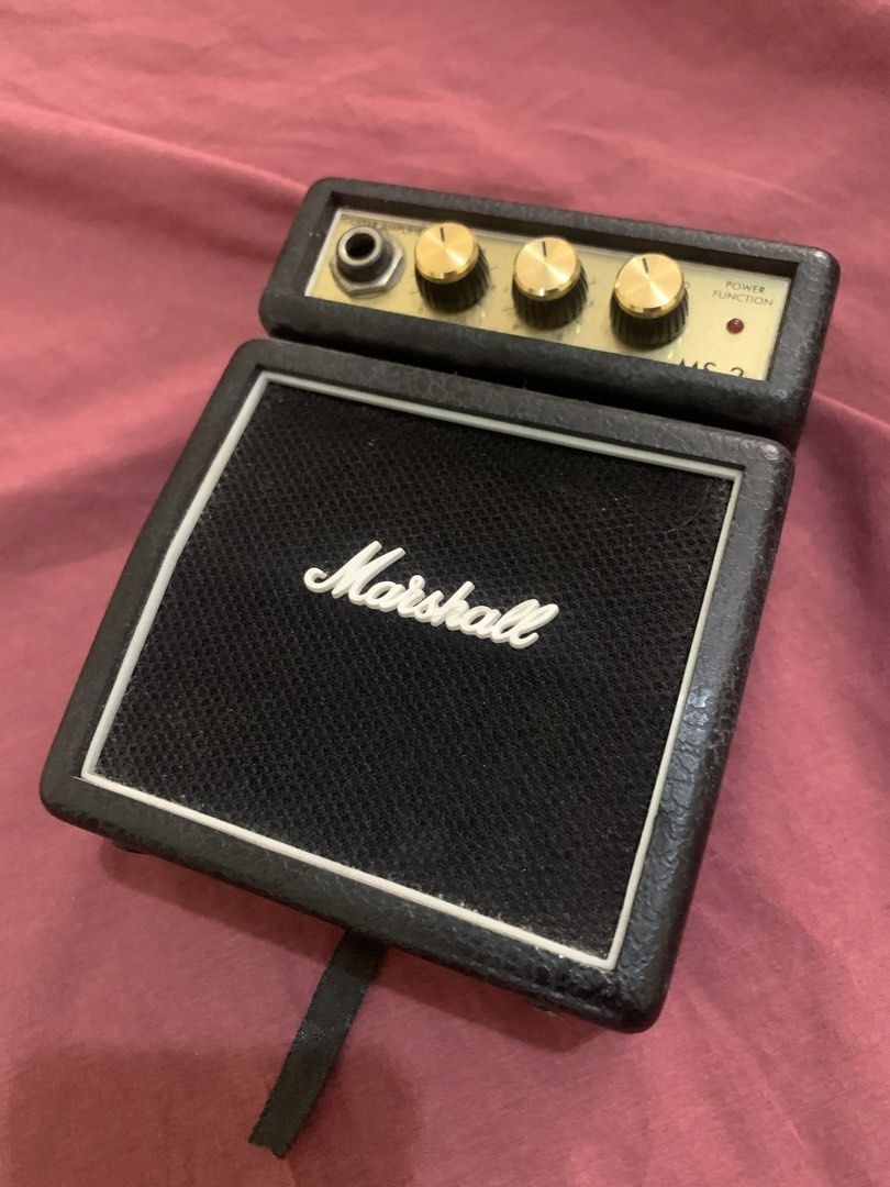 Marshall MS-2 Mini Guitar Amplifier (Category: Soundbars, Speakers & Amplifiers) located in Manila. Submitted by gamingthriftshop (Listing ID 1426054678, Image 2). Description: PAUNAHAN NALANG!! Discounted! Barely used Bought 2020 Naging display nalang siya No battery Decluttering need cash Marikina Area Pwede lalmove or pick up Pwede gcash or BPI.