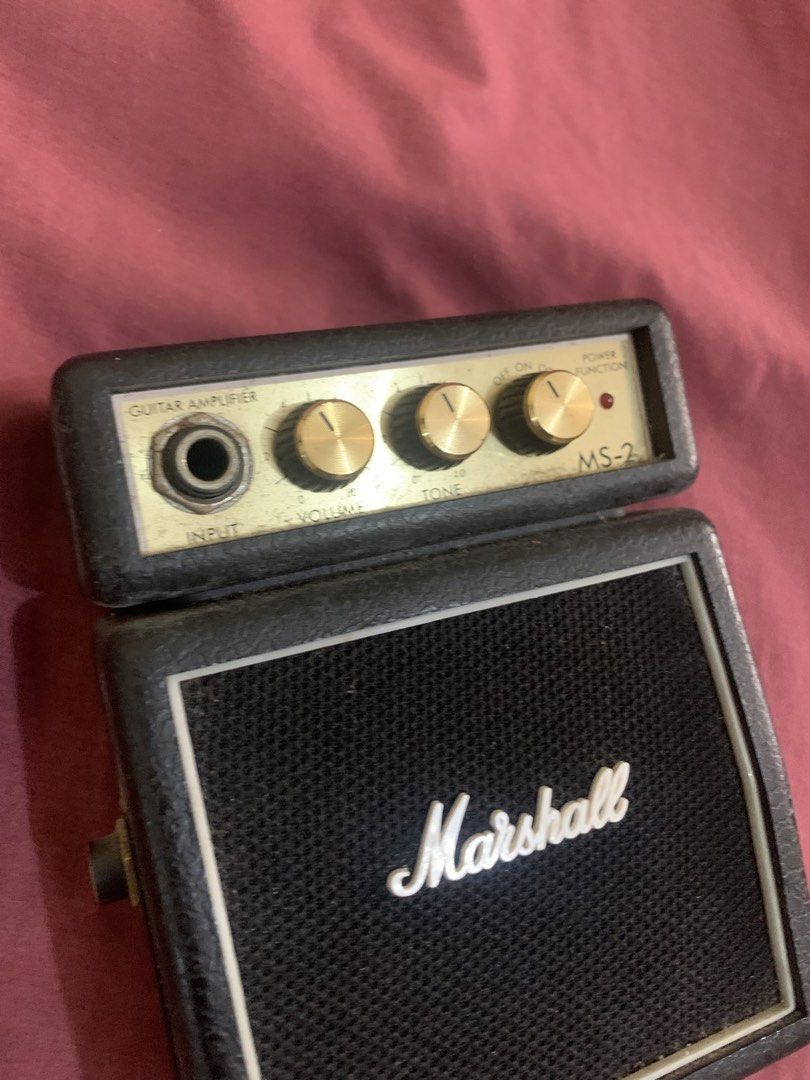 Marshall MS-2 Mini Guitar Amplifier (Category: Soundbars, Speakers & Amplifiers) located in Manila. Submitted by gamingthriftshop (Listing ID 1426054678, Image 3). Description: PAUNAHAN NALANG!! Discounted! Barely used Bought 2020 Naging display nalang siya No battery Decluttering need cash Marikina Area Pwede lalmove or pick up Pwede gcash or BPI.