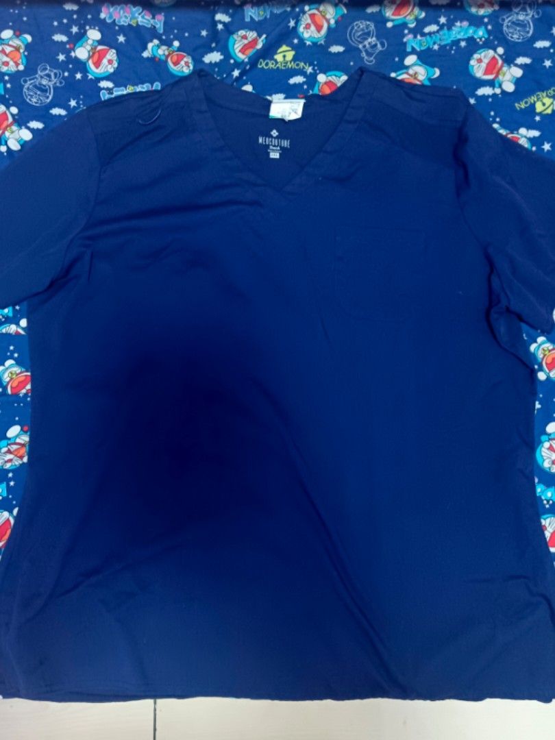 Medcouture Touch 2XL Scrub Top (Category: Others Tops) located in Bulacan. Submitted by gratsy (Listing ID 1426030624, Image 1). Description: Navy blue Medcouture Touch scrub top. It has a V-neck design and short sleeves. The size is 2XL..