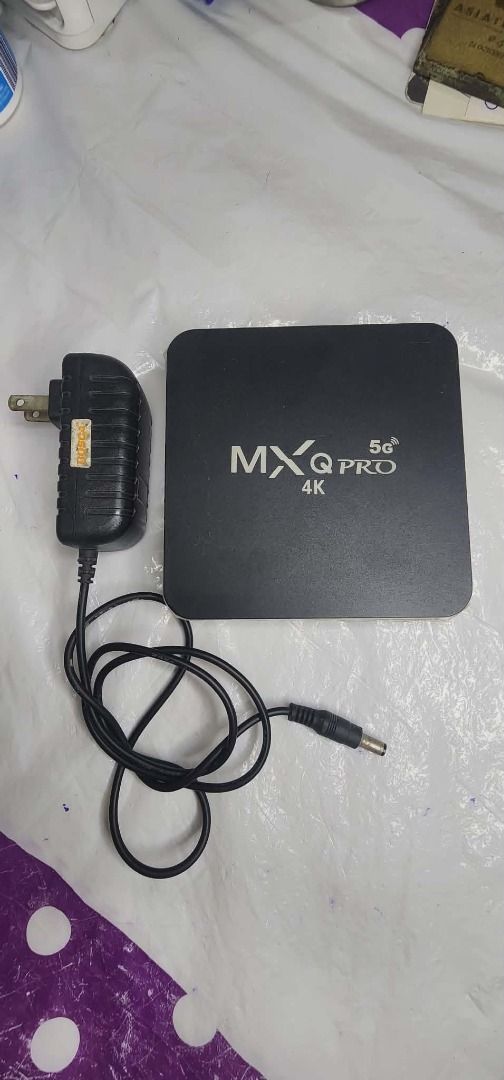 MXQ Pro 4K 5G Android TV Box (Category: Entertainment Systems & Smart Home Devices) located in Manila. Submitted by mwnadala (Listing ID 1426180123, Image 3). Description: Color: Black Package: Comes with Power Plug and Remote Control Condition: Used Reason for Selling: No more use Shipping: c/o Buyer Meet up: LRT 2 V. Mapa Station, 7-Eleven Amaia V. Mapa, Dunkin Donut Kalentong, Our Lady of Lourdes Hospital, Bacood or surrounding areas Issues: U