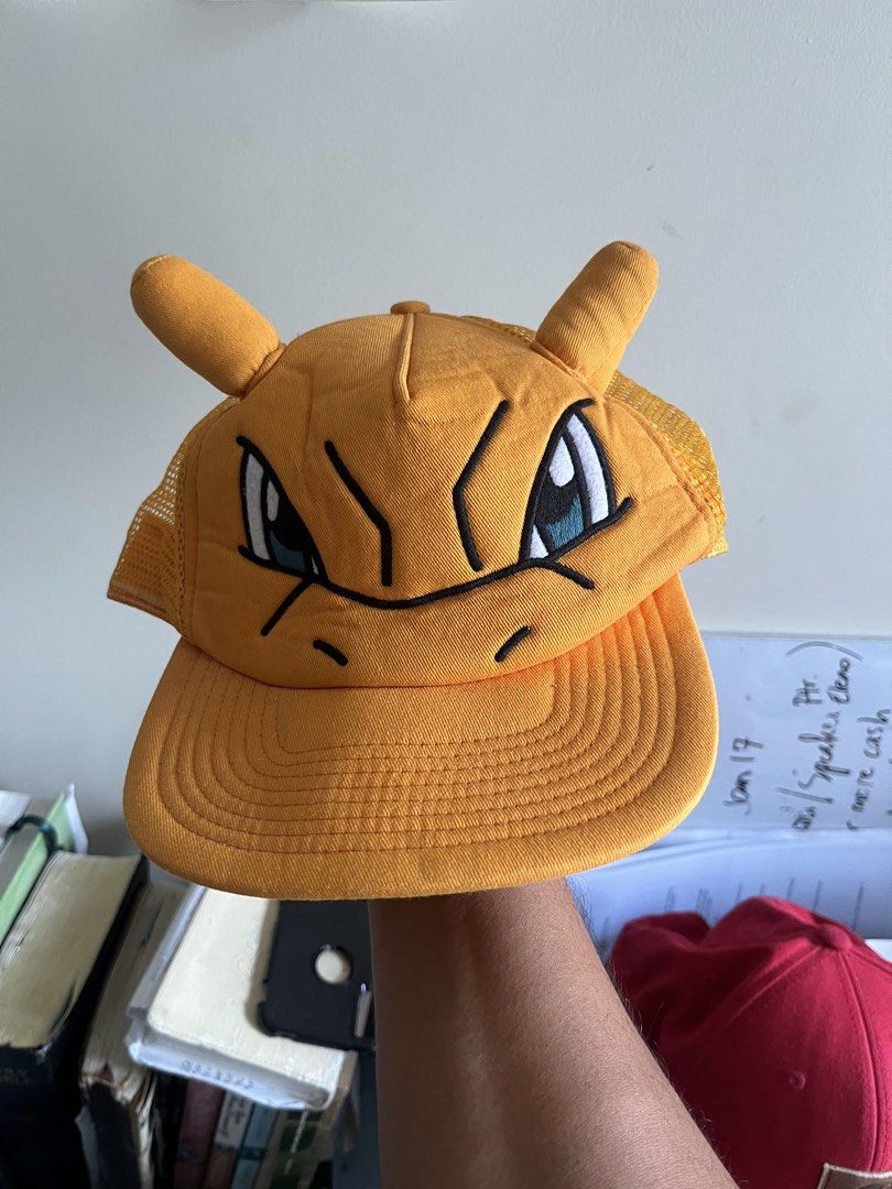 Pokemon Charizard Cap (Category: Caps & Hats) located in Calapan. Submitted by axlefinestpicks (Listing ID 1426020943, Image 1). Description: Hi Charizard fans! Selling this cool net cap. Charizard Cap with horns. Official Merch year 2015 With tag pero may damage na yung card tag. 1500+SF Dm to purchase..