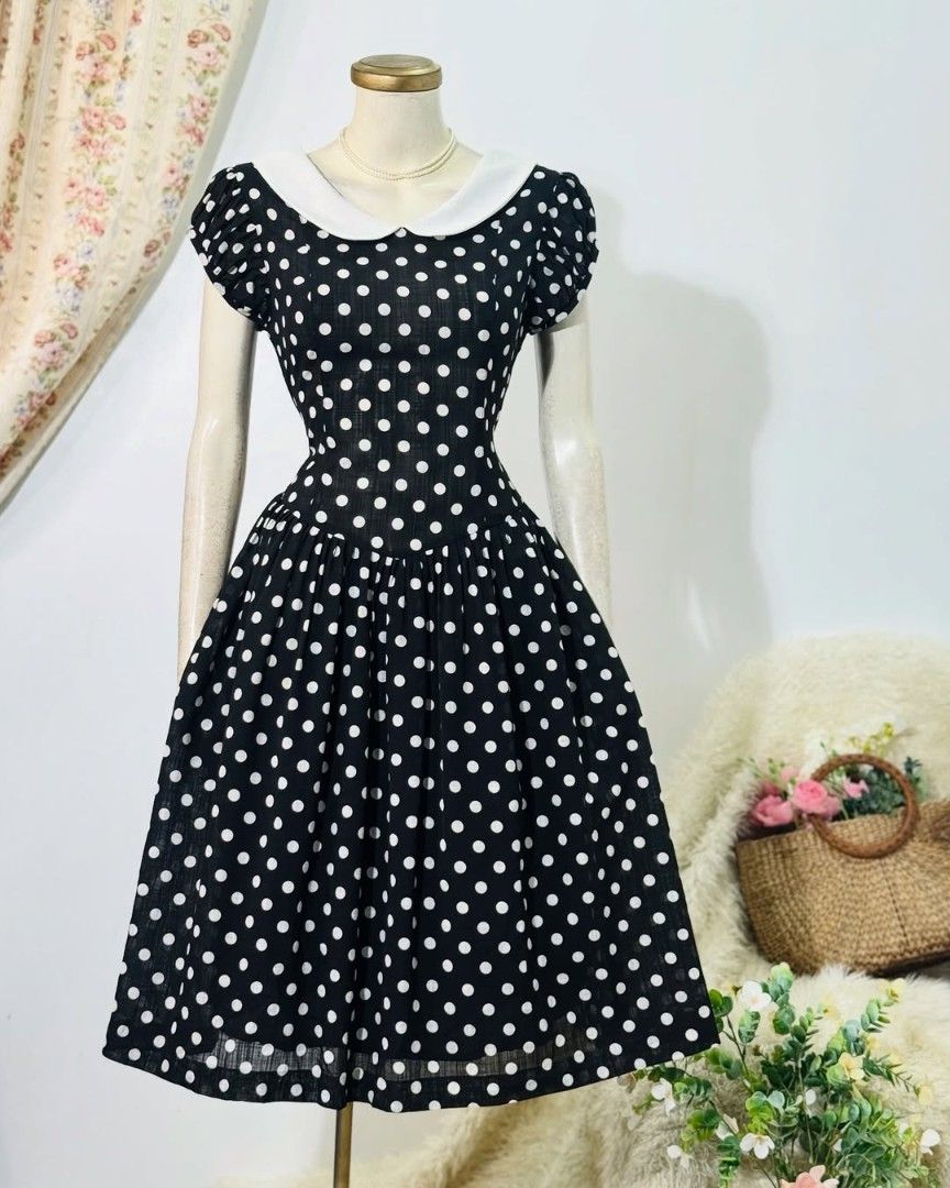 Polka Dot Dress with White Collar (Category: Dresses) located in Manila. Submitted by addicted2zara (Listing ID 1426080647, Image 1). Description: Dress features a classic polka dot pattern in black and white. It has a white collar and short sleeves. The dress has a fitted bodice and a flared skirt. It also has pockets. Perfect for a vintage-inspired look..