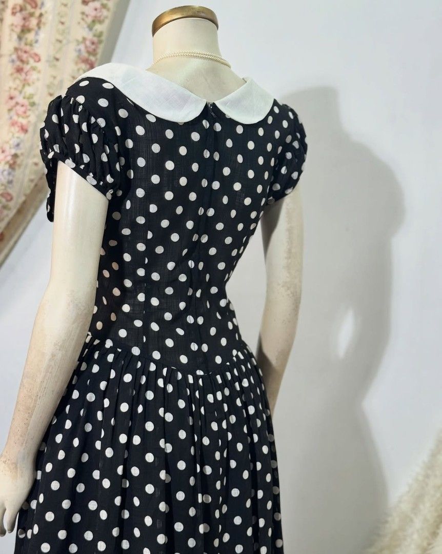 Polka Dot Dress with White Collar (Category: Dresses) located in Manila. Submitted by addicted2zara (Listing ID 1426080647, Image 3). Description: Dress features a classic polka dot pattern in black and white. It has a white collar and short sleeves. The dress has a fitted bodice and a flared skirt. It also has pockets. Perfect for a vintage-inspired look..