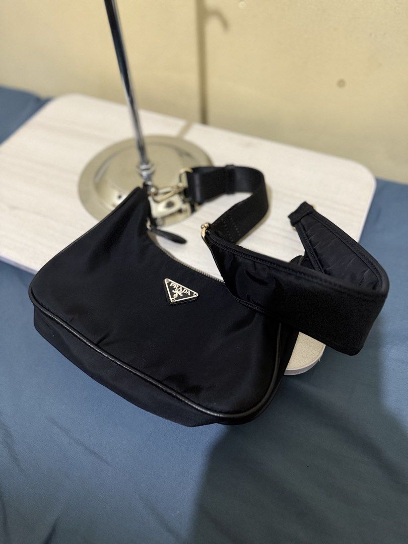 Prada Nylon Bag (Category: Luxury Bags & Wallets) located in Cagayan de Oro. Submitted by twice.but.nice.blackmarket (Listing ID 1426154762, Image 2). Description: - Excellent condition - Made in Italy on emblem logo - Color rate 9.5 - Height 6 - Width 9 What u see is what u get!.