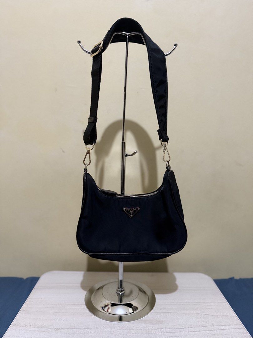 Prada Nylon Bag (Category: Luxury Bags & Wallets) located in Cagayan de Oro. Submitted by twice.but.nice.blackmarket (Listing ID 1426154762, Image 1). Description: - Excellent condition - Made in Italy on emblem logo - Color rate 9.5 - Height 6 - Width 9 What u see is what u get!.