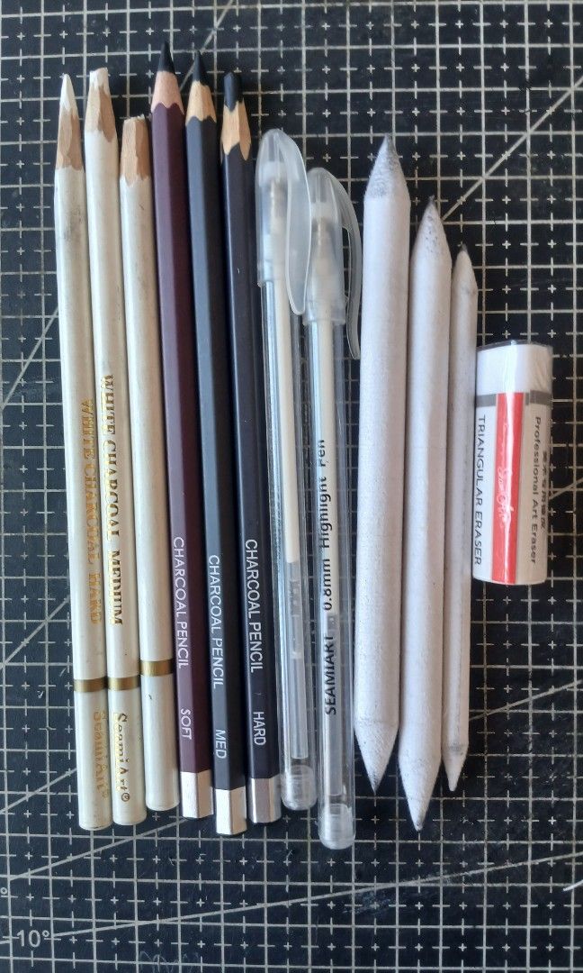 SeamiArt Charcoal Bundle (Category: Craft Supplies & Tools) located in Mandaue City. Submitted by sandown_clown (Listing ID 1426060355, Image 1). Description: Charcoal Set from the Seamiart graphite pencil set - Pencils were sharpened manually with xacto knife for overhand grip - Soft white charcoal tip got cut but can be sharpened again - Blending stumps are cleaned with eraser - Triangle eraser still in its plastic - All barely used; tested onc