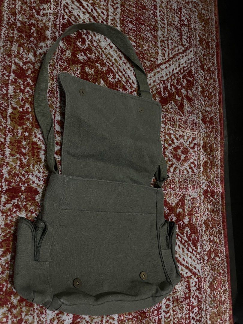 Totoro Canvas Messenger Bag (Category: Sling Bags) located in Dumaguete. Submitted by raspberrypepsi (Listing ID 1426128638, Image 2). Description: Used regularly for 3 months Bought for 3500 Flaws: has a hole on the bottom of the bag but can be easily patched Negotiable + Shipping Fee.