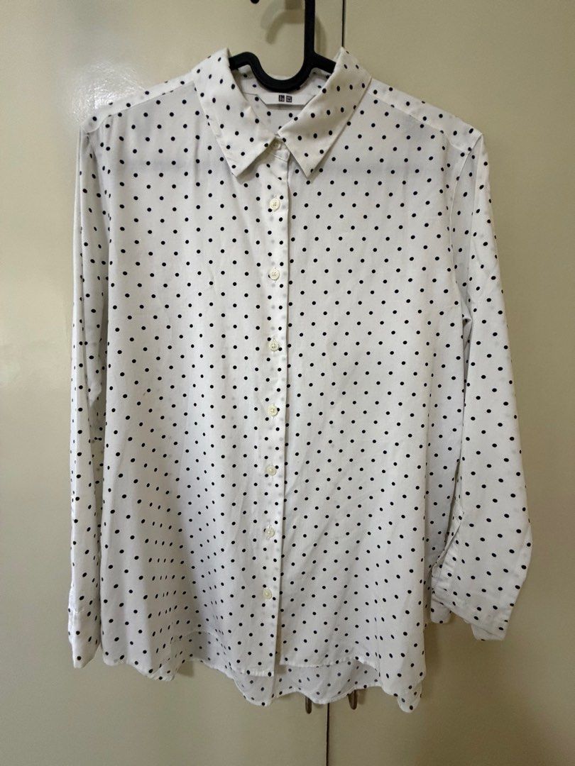 Uniqlo Polka Dot Shirt (Category: Shirts) located in Manila. Submitted by dencarmd (Listing ID 1426025584, Image 1). Description: White shirt with black polka dots from Uniqlo. Features a button-down front and long sleeves. The shirt has a classic collar and is size S. There are some stains on the front of the shirt..