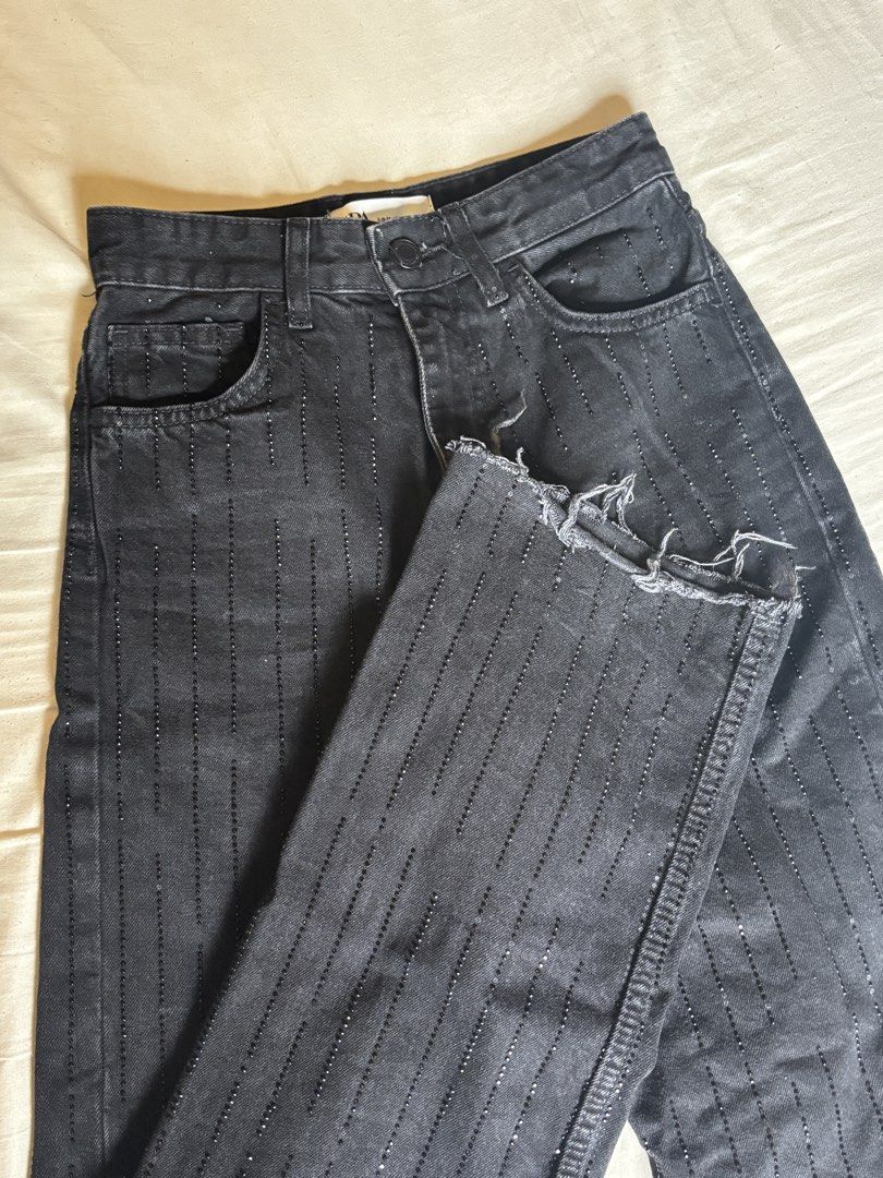 zara black embellished jeans (Category: Jeans) located in Makati City. Submitted by mibcloset (Listing ID 1426035508, Image 1). Description: — size 32 (best fits until 25” waist) — fits high waisted — worn 3x only — the design is really like teardrops, the lines dont go all the way down continuously so the gaps are not due to the rhinestones falling off. a lot of them are still intact — perfect for tall girls (5’5 and up) bc it’s long — love this