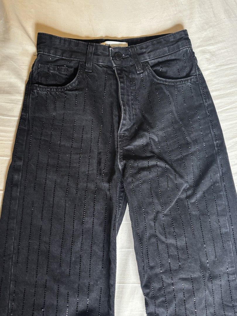 zara black embellished jeans (Category: Jeans) located in Makati City. Submitted by mibcloset (Listing ID 1426035508, Image 2). Description: — size 32 (best fits until 25” waist) — fits high waisted — worn 3x only — the design is really like teardrops, the lines dont go all the way down continuously so the gaps are not due to the rhinestones falling off. a lot of them are still intact — perfect for tall girls (5’5 and up) bc it’s long — love this