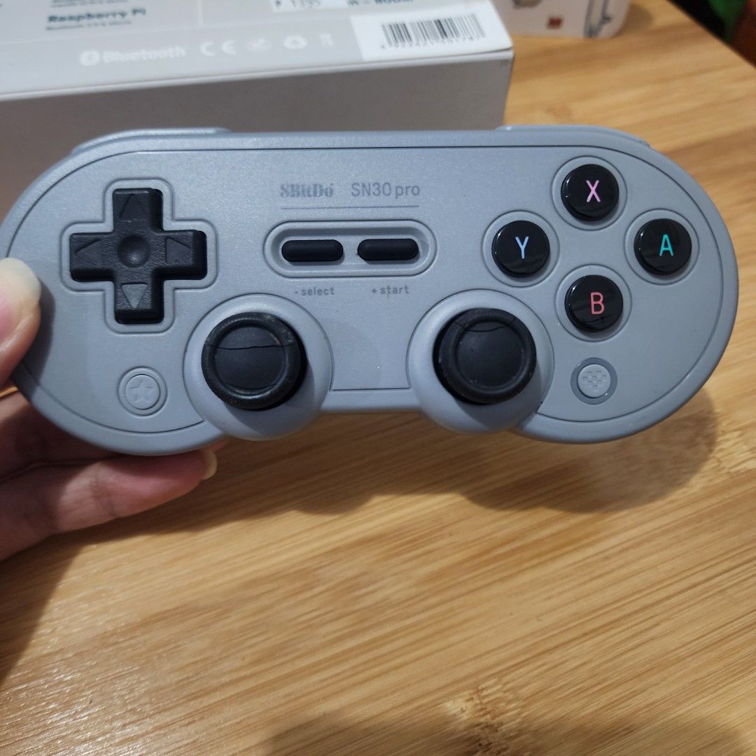 8BitDo SN30 Pro Bluetooth Gamepad (Category: Controllers) located in Manila. Submitted by aige09 (Listing ID 1426326075, Image 3). Description: 8BitDo SN30 Pro Bluetooth gamepad. Compatible with Switch, Windows, macOS, Steam, Raspberry Pi, and Android. Features Bluetooth connectivity. Includes the gamepad and its original box. Condition: Never use Mod: Direct jnt Mop: gcash/bank transfer.
