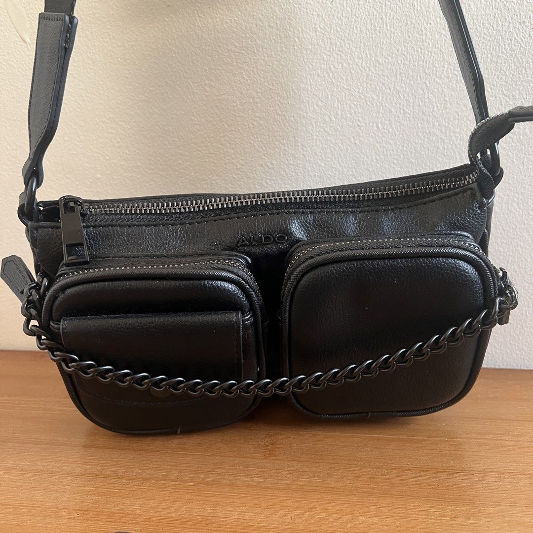 ALDO Black Crossbody Bag with Chain (Category: Cross-body Bags) located in Marikina City. Submitted by declutter.marikina (Listing ID 1426376757, Image 2). Description: bought in us. almost new, only used once. but visible flaw on one chain (see listing pics) .