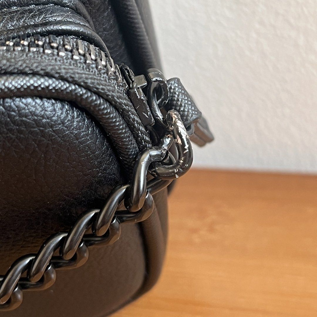 ALDO Black Crossbody Bag with Chain (Category: Cross-body Bags) located in Marikina City. Submitted by declutter.marikina (Listing ID 1426376757, Image 3). Description: bought in us. almost new, only used once. but visible flaw on one chain (see listing pics) .