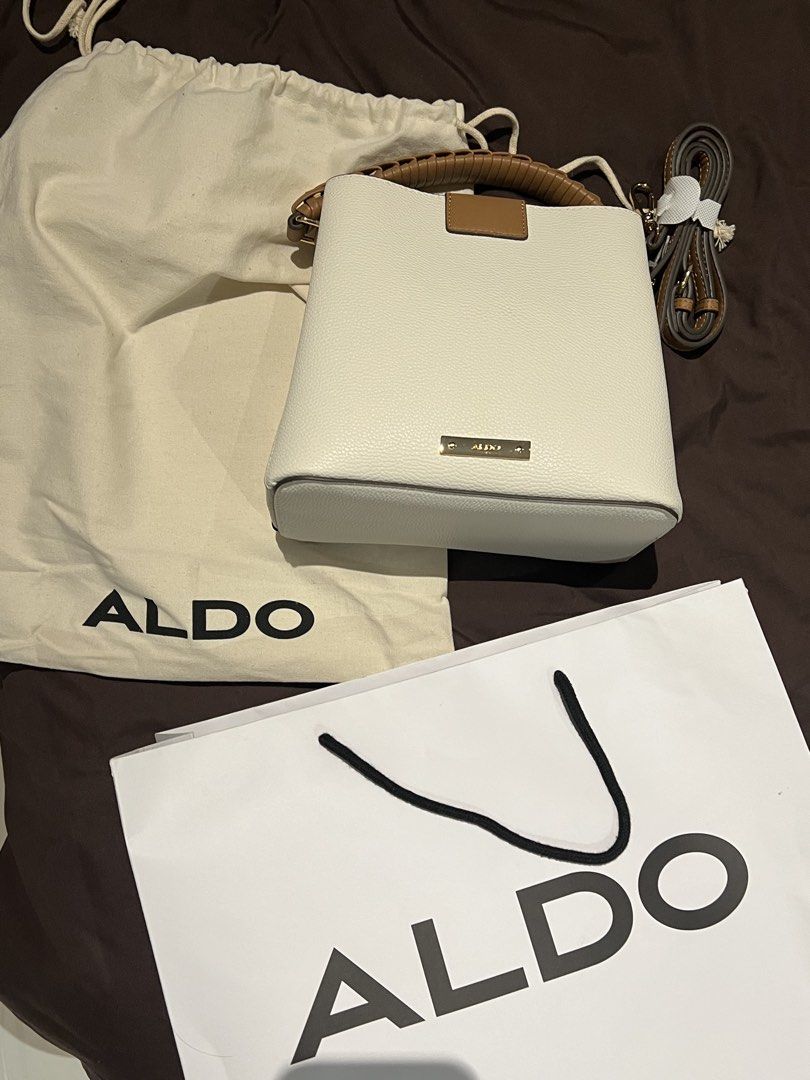 Aldo White Bucket Bag with Braided Handle (Category: Shoulder Bags) located in Paranaque City. Submitted by lois.ng (Listing ID 1426365215, Image 2). Description: Original Aldo Bucket Bag Dimensions: 25 Cm x 23 Cm x 14 Cm (H x L x W) Handle Drop Length: 4.00 In (10.16 Cm) Strap Drop Length: 23.00 In (58.42 Cm).