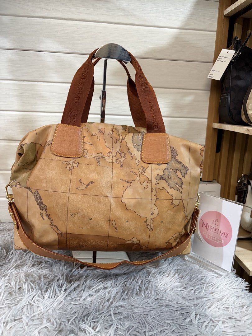 Alviero Martini Geo Map Two Way Bag (Category: Luxury Bags & Wallets) located in Malvar. Submitted by nikaellascollection_0923 (Listing ID 1426255074, Image 1). Description: Preloved, Guaranteed Authentic 9/10 condition .