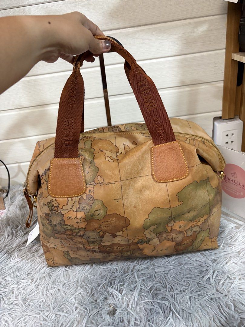 Alviero Martini Geo Map Two Way Bag (Category: Luxury Bags & Wallets) located in Malvar. Submitted by nikaellascollection_0923 (Listing ID 1426255074, Image 2). Description: Preloved, Guaranteed Authentic 9/10 condition .