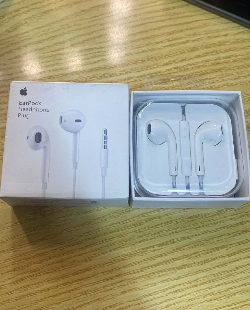Apple EarPods with 3.5 mm Headphone Plug (Category: Earphones) located in Manila. Submitted by milasgadgetph (Listing ID 1426302106, Image 1). Description: EarPods with 3.5 mm Headphone Plug. Comes with the original box and packaging. The earphones are white. The box shows the Apple logo and the product name. The earphones are in a clear plastic case inside the box..