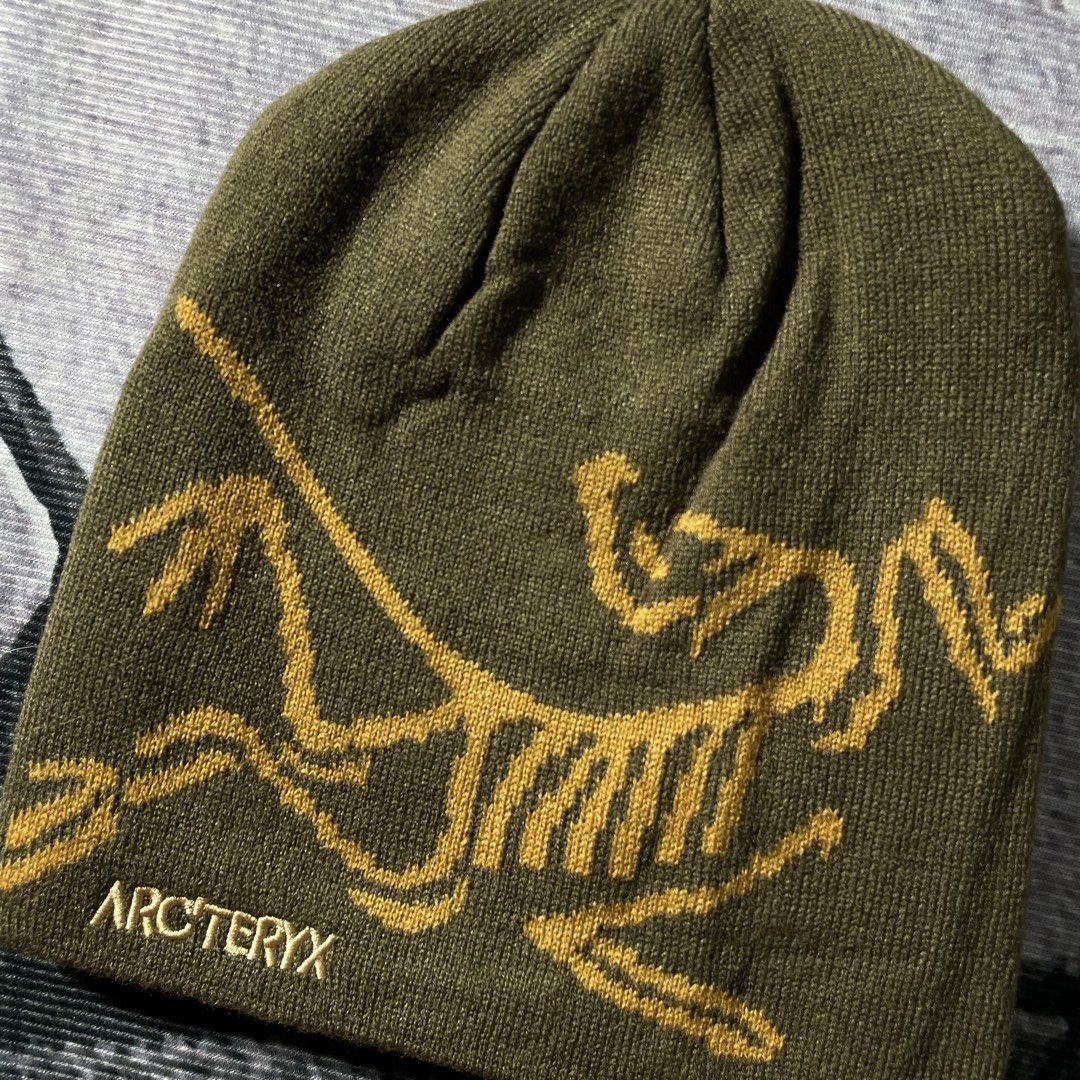 Arc'teryx Fernie Toque Beanie (Category: Caps & Hats) located in Cavite. Submitted by ferrerapparel. (Listing ID 1426205886, Image 3). Description: Arc'teryx Fernie Toque beanie in olive green. Features the Arc'teryx logo embroidered on the front. The tag indicates the model is Fernie Toque, made in Indonesia. The beanie has a ribbed knit construction..