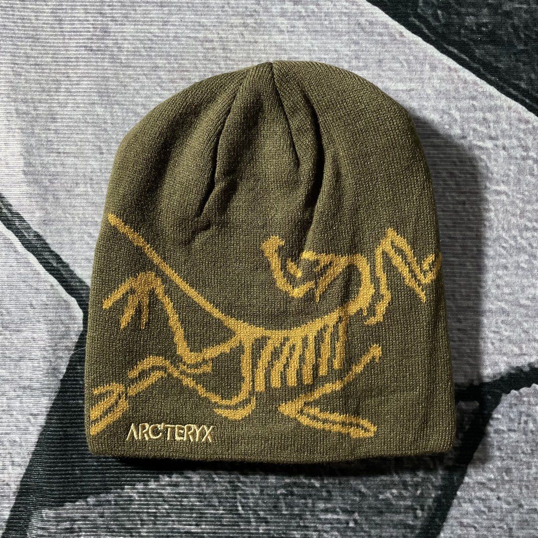 Arc'teryx Fernie Toque Beanie (Category: Caps & Hats) located in Cavite. Submitted by ferrerapparel. (Listing ID 1426205886, Image 1). Description: Arc'teryx Fernie Toque beanie in olive green. Features the Arc'teryx logo embroidered on the front. The tag indicates the model is Fernie Toque, made in Indonesia. The beanie has a ribbed knit construction..