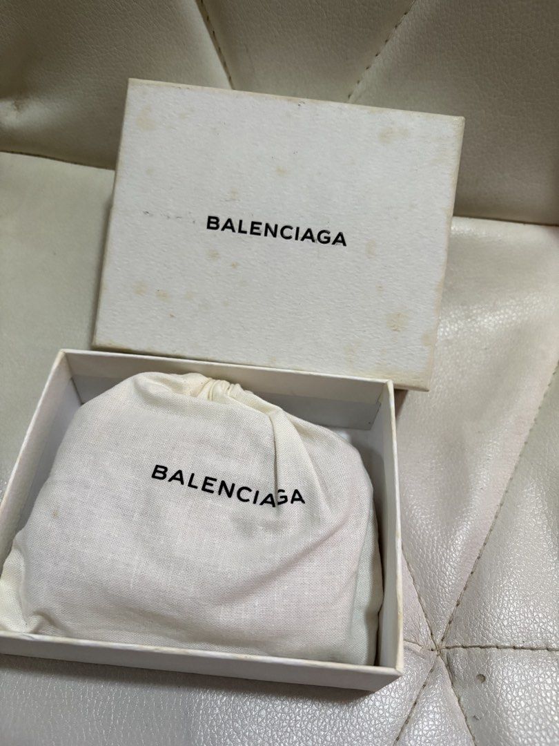 Authentic Balenciaga Papier mini trifold leather wallet (Category: Luxury Bags & Wallets) located in Cavite. Submitted by cbmae (Listing ID 1389828447, Image 2). Description: comes with box, cards, and dust bag with slightly color fade and pen marks, no damage.