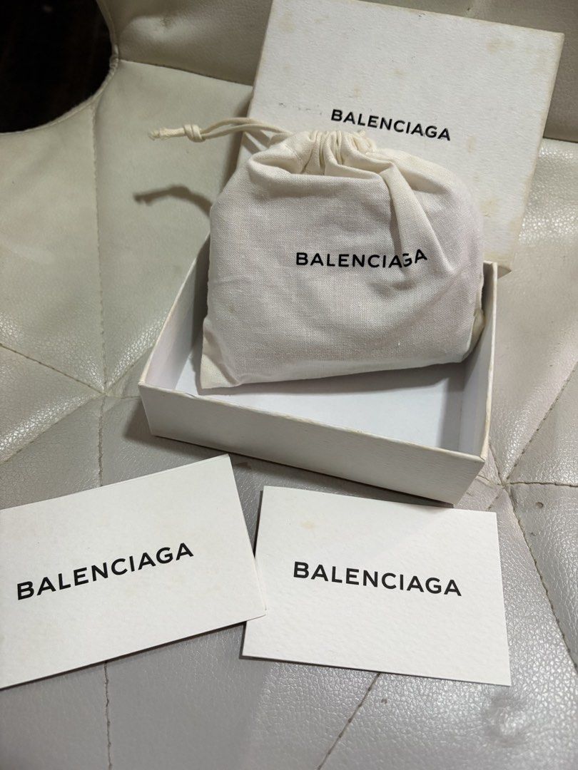 Authentic Balenciaga Papier mini trifold leather wallet (Category: Luxury Bags & Wallets) located in Cavite. Submitted by cbmae (Listing ID 1389828447, Image 3). Description: comes with box, cards, and dust bag with slightly color fade and pen marks, no damage.