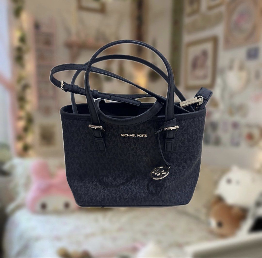 Authentic Michael Kors Small Tote Bag (Category: Luxury Bags & Wallets) located in Manila. Submitted by sofiaax (Listing ID 1426206646, Image 1). Description: letting go of this gorgeous black monogram michael kors tote bag! -condition is 10/10, no flaws! -can take more pics of it, just inquire :) -can negotiate payment: gcash delivery: j&t or lalamove :) tags: authetic mk tote bag charlotte tote signature monogram luxury bag designer vintage saf