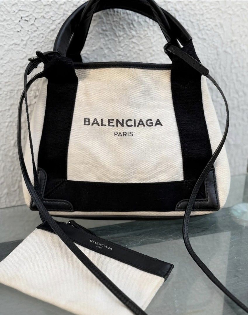 BALENCIAGA Navy Cabas mini | with removable pouch (Category: Luxury Bags & Wallets) located in Quezon City. Submitted by rmseller.2017 (Listing ID 1426255912, Image 1). Description: BALENCIAGA Navy Cabas mini | with removable pouch | very good condition | perfect for summer too | P23,500 only (open for installment).