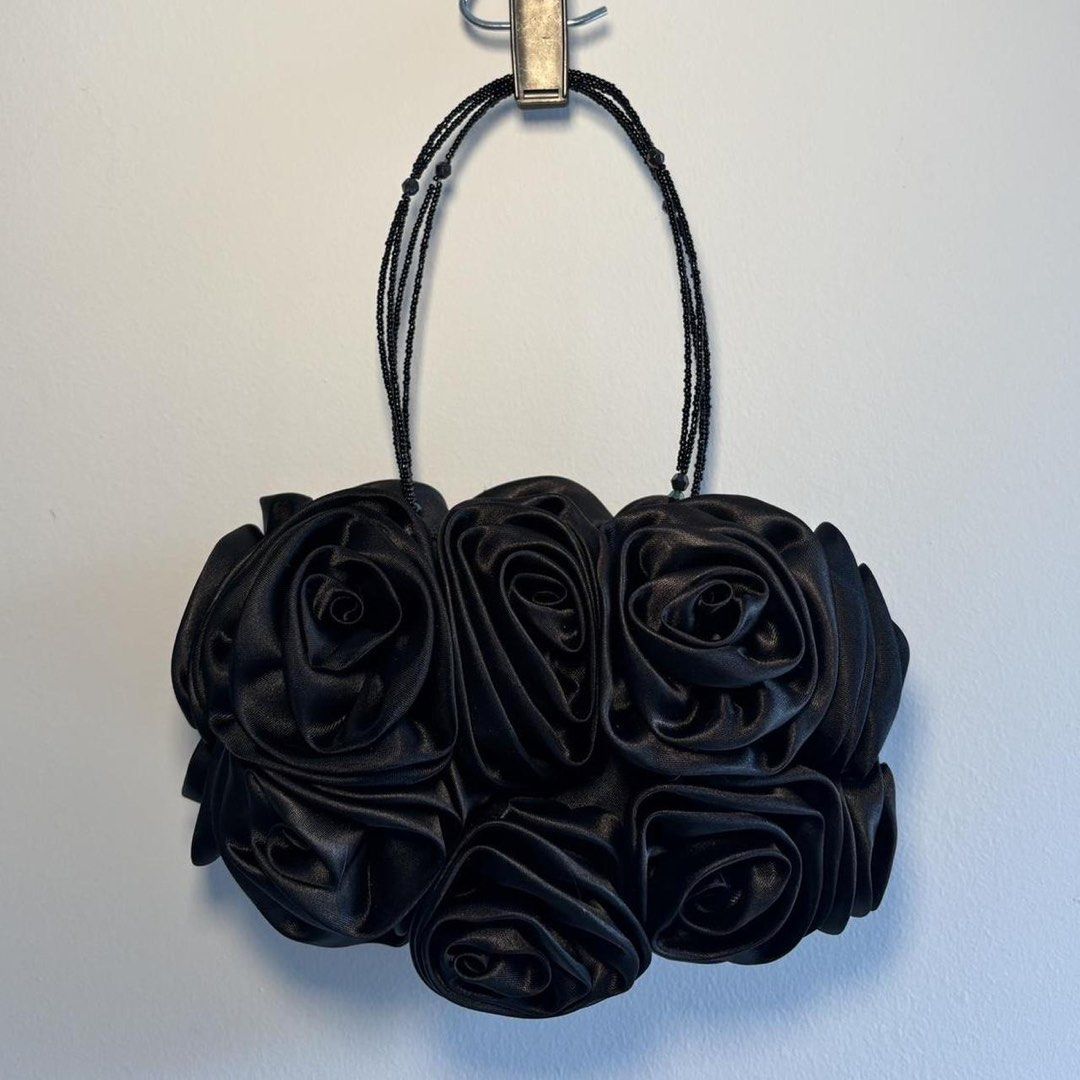 Black Rose Handbag- Party Bag Small size (Category: Luxury Bags & Wallets) located in Tagum. Submitted by itscookiemonster (Listing ID 1426340826, Image 1). Description: Hey there! Check out this awesome Party Bag Black Rose. The design is super stylish, perfect for events. The material is satin feels really nice and durable and elegant. Grab it before someone else does! Size : 8inx 6in (WxH).