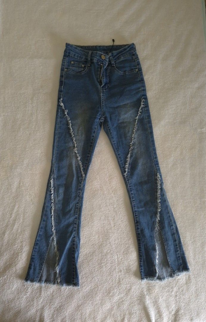 Blue Flare Jeans with Distressed Details (Category: Jeans) located in Paranaque City. Submitted by hbd1233 (Listing ID 1426192428, Image 1). Description: No flaws.