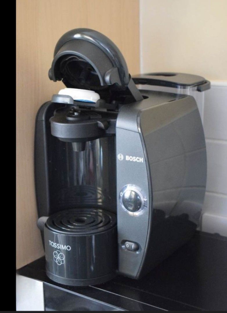 BOSCH TASSIMO ONE TOUCH ESPRESSO COFFEE MACHINE,110v (Category: Coffee Machines & Makers) located in Quezon City. Submitted by carsenmktg (Listing ID 1426359007, Image 2). Description: BOSCH TASSIMO ONE TOUCH ESPRESSO COFFEE MACHINE,110v guaranteed authentic. was an office equipment but still im good condition. no functional defects, no cracks or dents. minor surface scuffs that are barely noticeable. bought in the u.s. for about Php18,000+.orig 