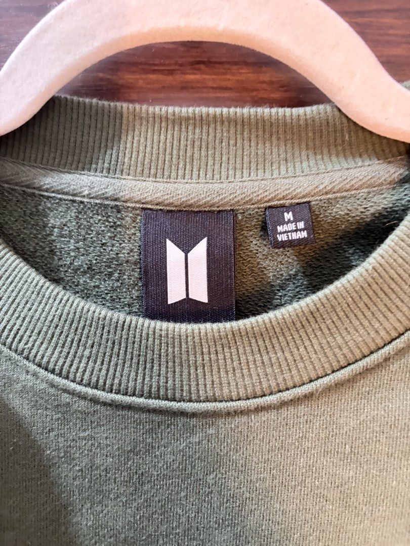 BTS Jin Sweatshirt - Olive Green - Size M (Category: Coats, Jackets and Outerwear) located in Las Pinas. Submitted by kathycv (Listing ID 1426248948, Image 3). Description: - BTS Jin Sweatshirt - Olive Green, Size M - Features a unique Jin graphic design - Made of 100% cotton - Delivery c/o buyer - Located in BGC Taguig.