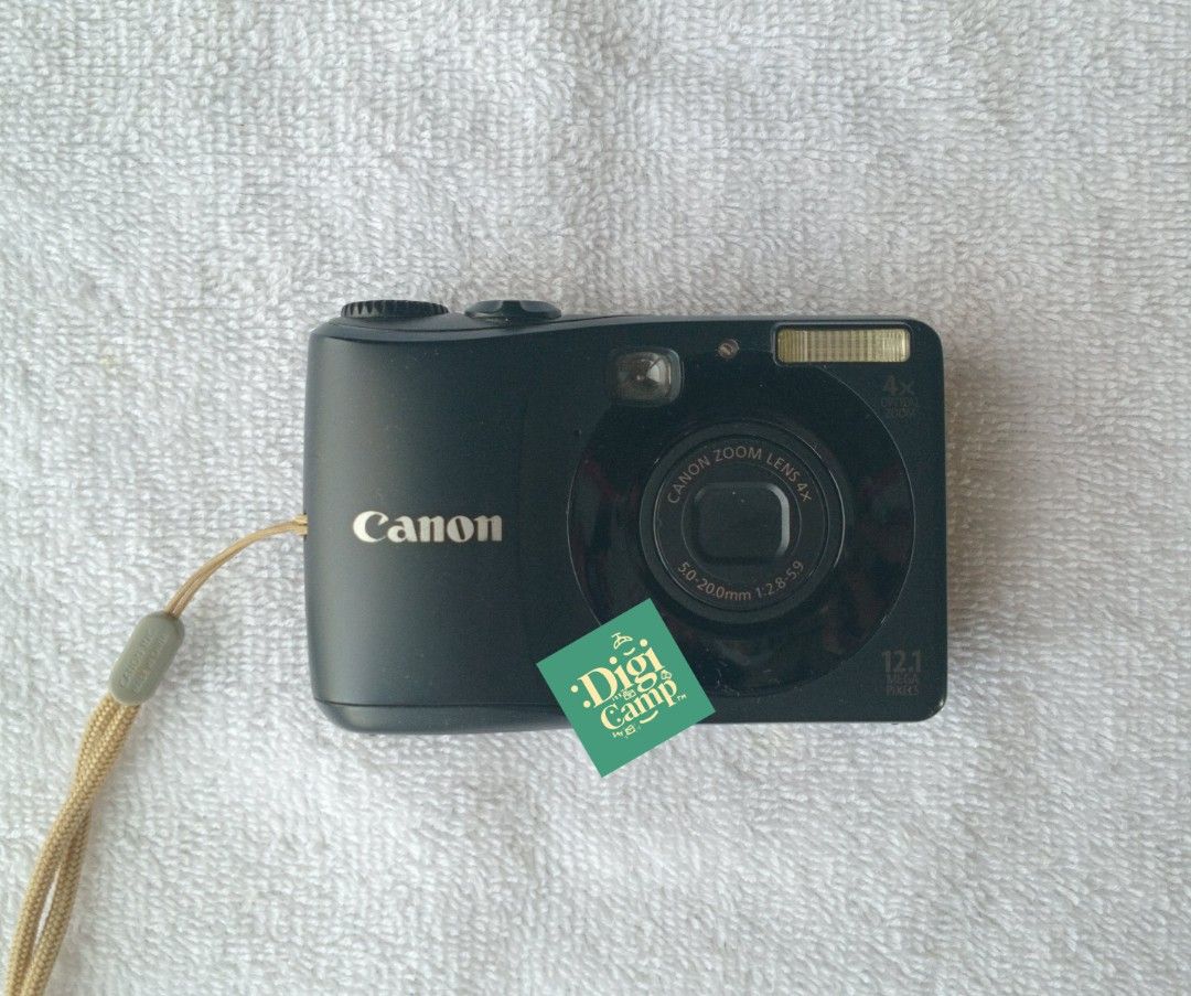 Canon PowerShot A1200 HD BLACK (Category: Cameras) located in Lingayen. Submitted by Audio_test_study (Listing ID 1426270015, Image 1). Description: CANON POWERSHOT A1200 HD 🐈‍⬛ Jennie Cam 🐈‍⬛ CONDITION • Body: 8.5/10 • No issues • No functional issues • Clean, non-hazy output 🐈‍⬛ WORKING ✓ Photo ✓ Video ✓ Zoom ✓ Flash ✓ All buttons 🐈‍⬛ SPECS ♡ 12.1MP CCD Sensor ♡ 4× Optical Zoom ♡ 2.7" LCD with Viewfinder 🐈‍⬛ INCLUSIONS ♡ Unit ♡ 4× AA Batte