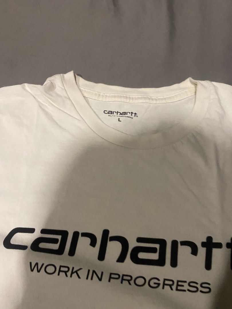 Carhartt Work In Progress White T-shirt (Category: Tshirts & Polo Shirts ) located in Manila. Submitted by thriftnijames (Listing ID 1426211880, Image 2). Description: Dimes L 28 W 20.