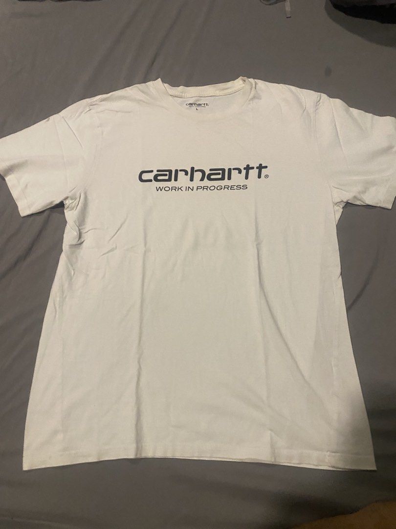 Carhartt Work In Progress White T-shirt (Category: Tshirts & Polo Shirts ) located in Manila. Submitted by thriftnijames (Listing ID 1426211880, Image 1). Description: Dimes L 28 W 20.