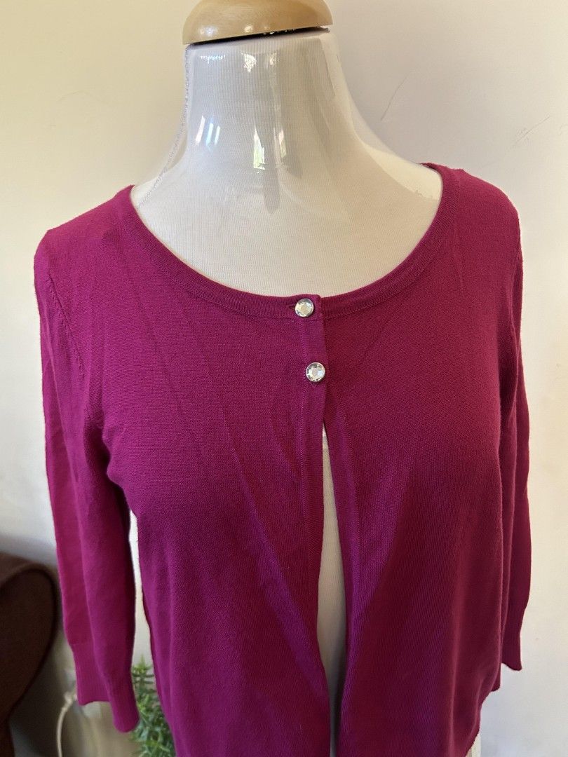 Express Design Studio Cardigan (Category: Coats, Jackets and Outerwear) located in Quezon City. Submitted by plus4lessshop (Listing ID 1426356895, Image 1). Description: Express Design Studio cardigan is a vibrant magenta color. It features a round neckline and three-quarter sleeves. The cardigan has two decorative buttons. The size is small..