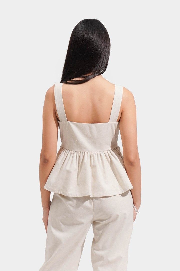 Forme Linen Peplum Top - Extra Large (Category: Blouses) located in Quezon City. Submitted by ohhlalawho (Listing ID 1426330391, Image 2). Description: Used, but in like new condition. Size XL (fits bust 38C; see size chart). I wasn't able to wear this a lot, pero isa ito sa mga paborito kong top. Bought this in store for P1298. Current price is still slightly negotiable. RFS: lost weight Can give discount if you buy 2 or more items..