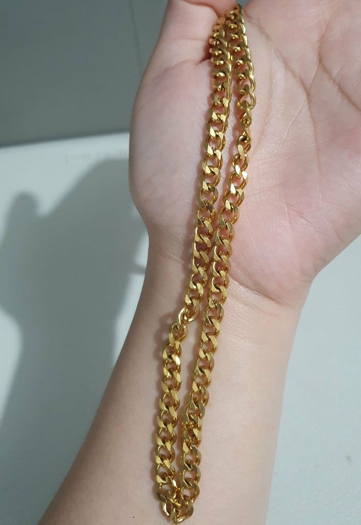 Gold tone Curb Chain Necklace (Category: Necklaces) located in Las Pinas. Submitted by broeater (Listing ID 1426336088, Image 2). Description: Gold curb chain necklace is a classic and stylish accessory. The chain features a series of interlocking links, creating a bold and eye-catching design. The gold color adds a touch of elegance and sophistication to any outfit..