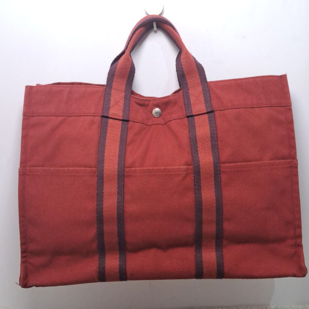 Hermes Paris Canvas Tote Bag Maroon (Category: Luxury Bags & Wallets) located in Caloocan City. Submitted by 2ndhand.manila (Listing ID 1426238832, Image 1). Description: 18 in x 12 H x 5 D ▪️NO COD/COP ▪️Ship thru J&T ▪️Lalamove/Grab Express ▪️G-Cash or Bank Transfer ▪️Location: North Caloocan.