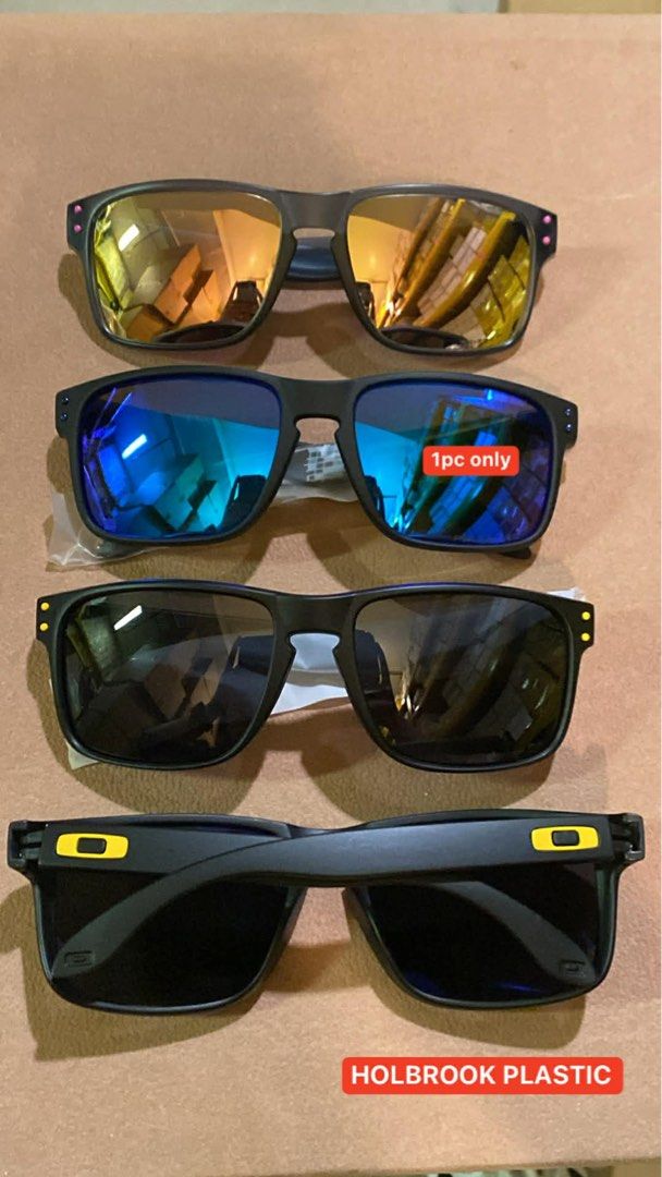 Holbrook Plastic Sunglasses - Limited Stocks (Category: Sunglasses & Eyewear) located in San Juan City. Submitted by chicqui (Listing ID 1426249028, Image 2). Description: Stylish Holbrook Plastic sunglasses available in various colors. Includes models with red, green, and black lenses. Some models feature a silver logo. Limited stock available. Also available are Holbrook Mix sunglasses in all brown, and Jupiter Carbon sunglasses with blue and g