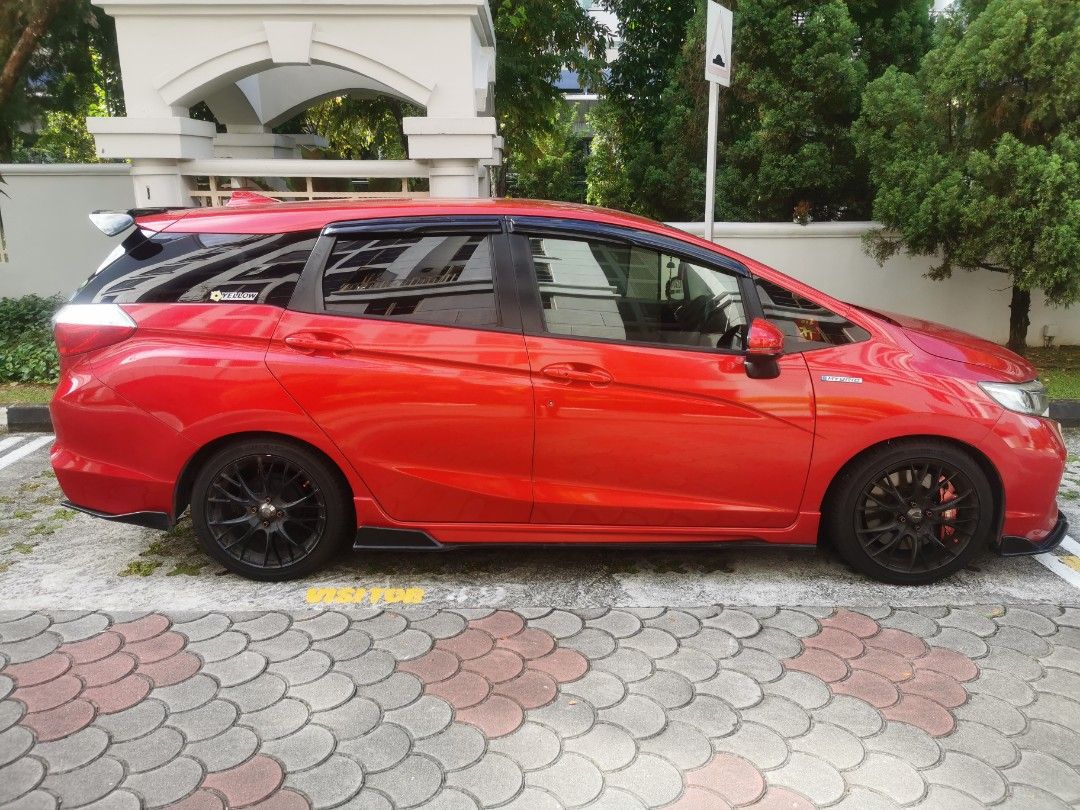 Honda Shuttle Hybrid 1.5 (A) (Category: Used Cars) located in Singapore. Submitted by YewteeArea (Listing ID 1426205946, Image 1). Description: Gearbox done late 2024. 4 new tyres on. 17rim and big brake kit and new suspension racing kit install (one month).. Rear auto tailgate (3month) PRICE Negotiable 👌.