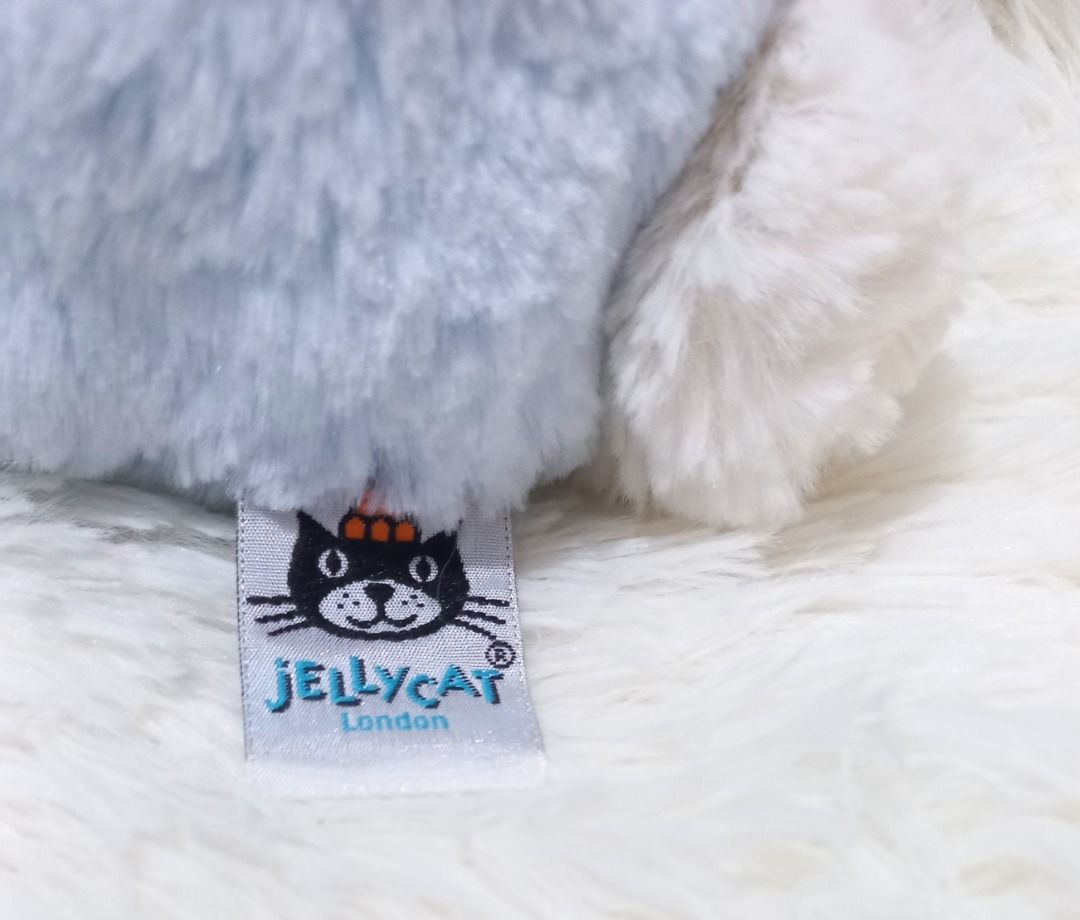 Jellycat Bashful Blue Bunny( available 2pcs)(Medium) (Category: Plushies & Soft Toys) located in Taguig. Submitted by phlercollections (Listing ID 1426226533, Image 3). Description: Adorable Jellycat Bashful Bunny is a soft and cuddly plush toy. It features long, floppy ears and a sweet pink nose. The bunny is a light blue color and has a fluffy texture. Perfect for snuggling or as a decorative piece in a nursery or bedroom..